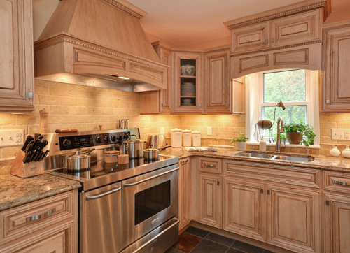 Cambria Buckingham with Rustic Traditional Kitchen Cabinets, Tumbled Travertine Brick Style Tiles, Natural Slate Flooring and Stainless Steel Appliance